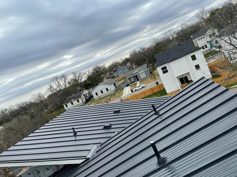 Standing seam metal roof panels with vents for Skylight Repair in Oyster Bay